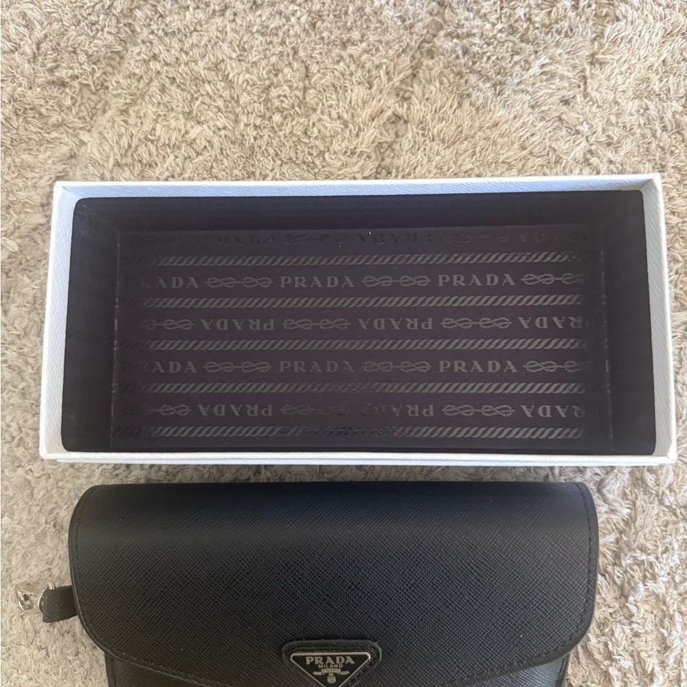 Prada Black Women's Cat-Eye Sunglasses with Silver Logo Accent - Picture 8 of 9